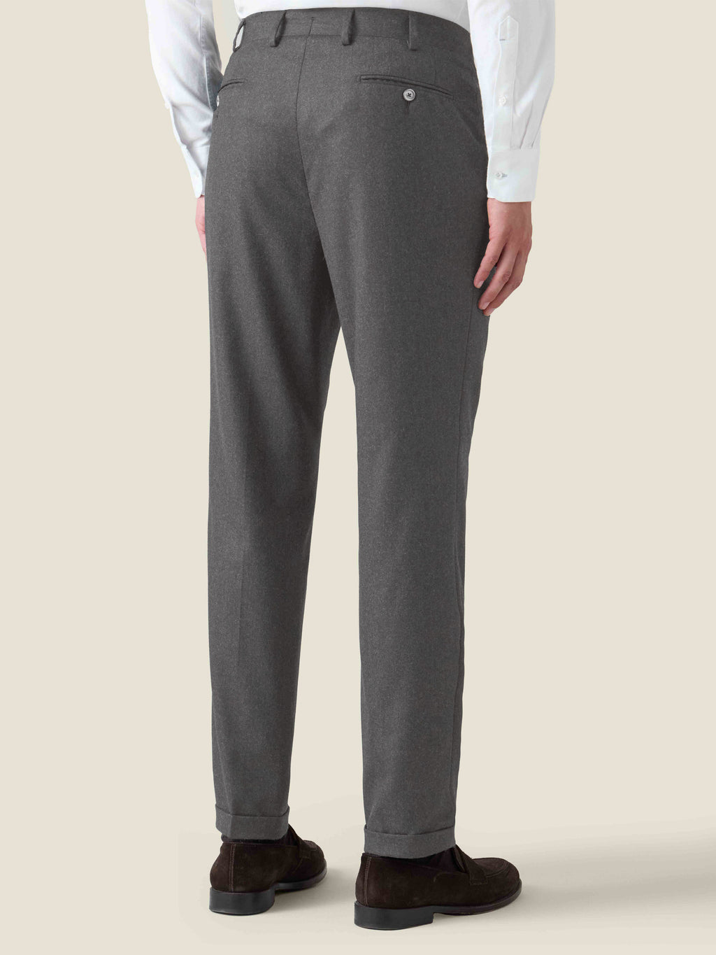 Back view of the Luca Faloni Light Grey Wool Suit trousers, shown on a model.