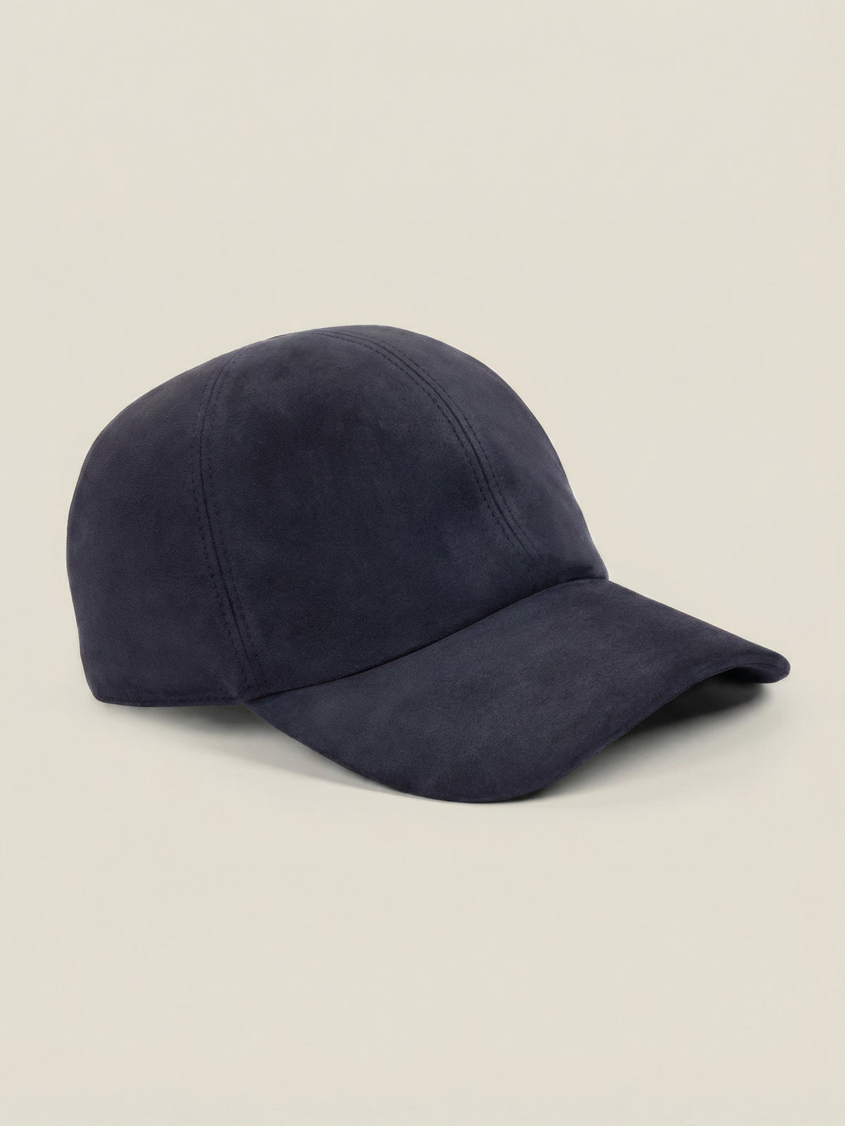 Midnight blue goatskin suede baseball cap with a classic six-panel design, shown from a side angle on a plain background.