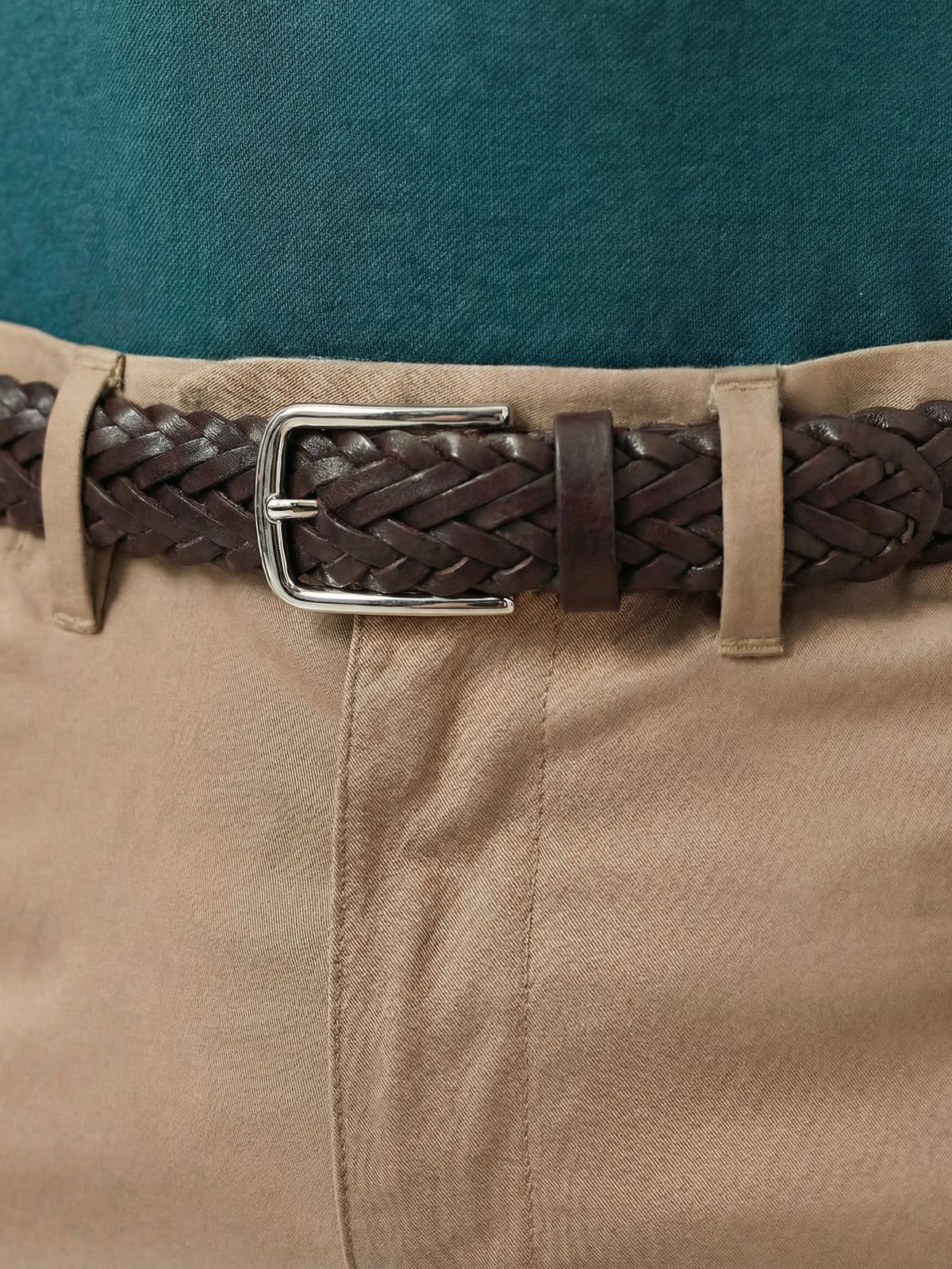 Woven Chocolate Brown Western Calf Leather Belt with a metal buckle, worn with sand-colored trousers.