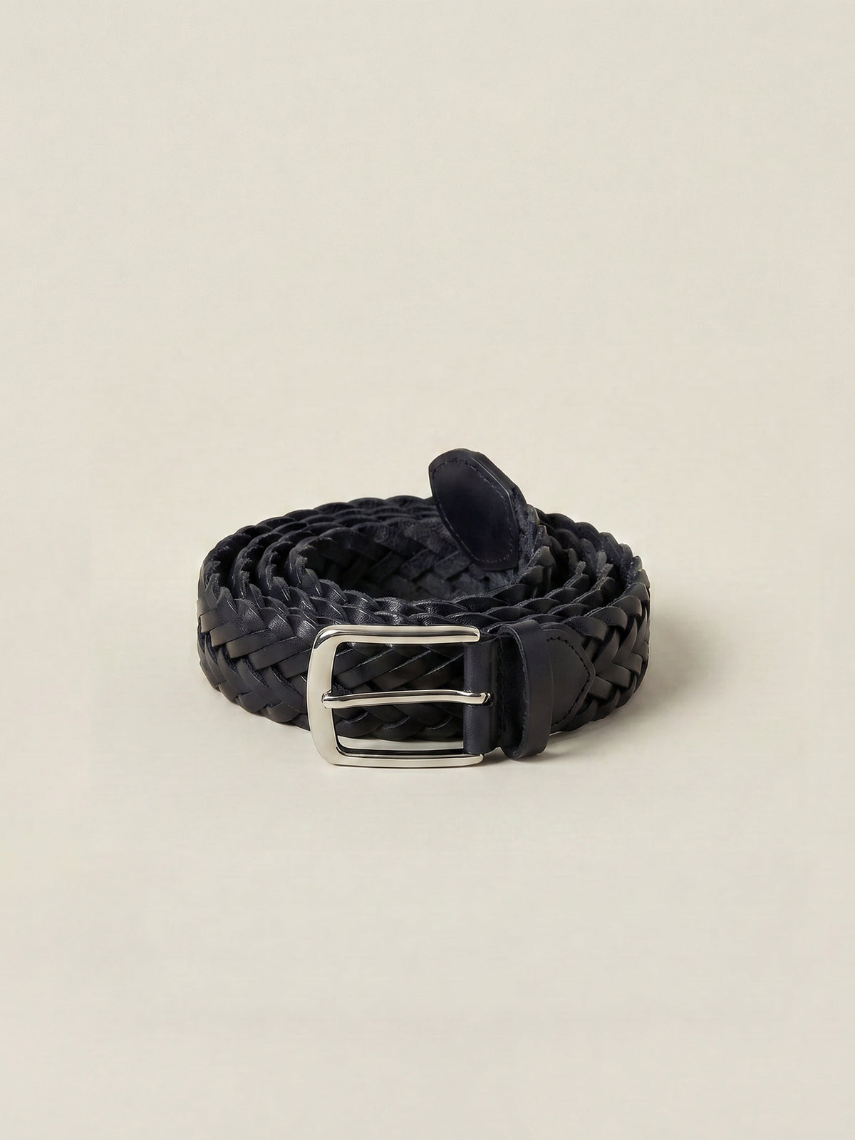 Midnight Blue Western Calf Leather Belt with a woven texture and silver-tone metal buckle, coiled on a neutral background.