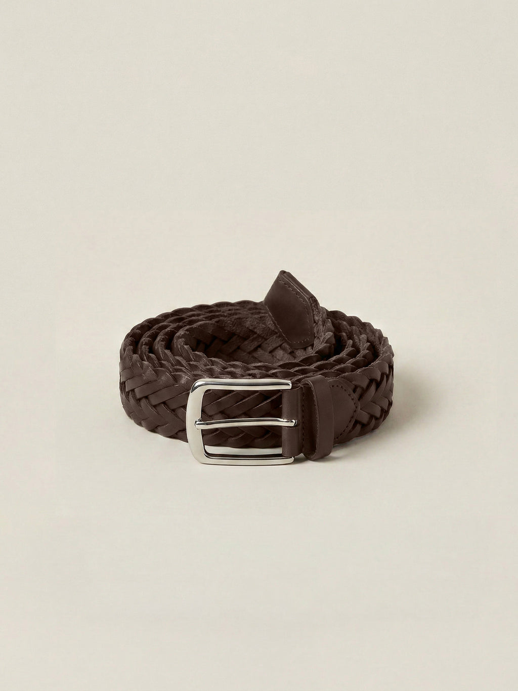 Chocolate brown Western Calf Leather Belt with a woven texture and silver-toned buckle, coiled on a light background.