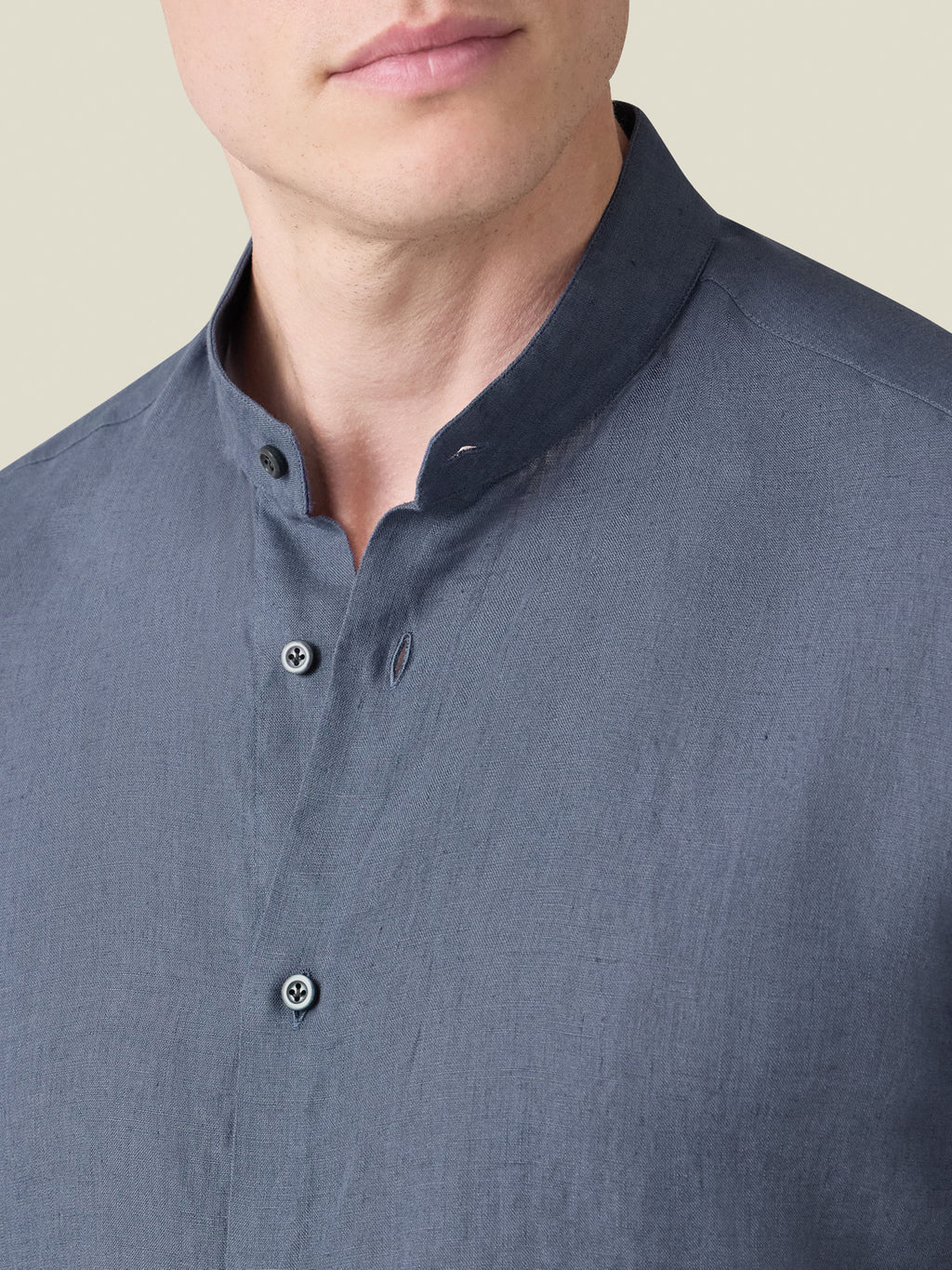 Payne's Grey Versilia Linen Shirt close-up, featuring a band collar and mother-of-pearl buttons.