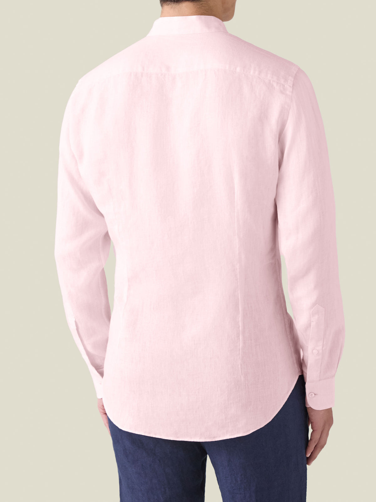 Back view of the light pink Versilia Linen Shirt in pure linen, featuring a band collar and a tailored fit.
