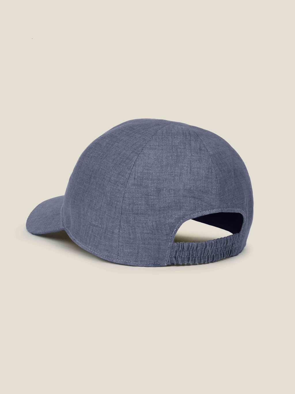 Back view of the Payne's Grey Linen Baseball Cap, highlighting the texture of the fabric and the elasticated back strap.