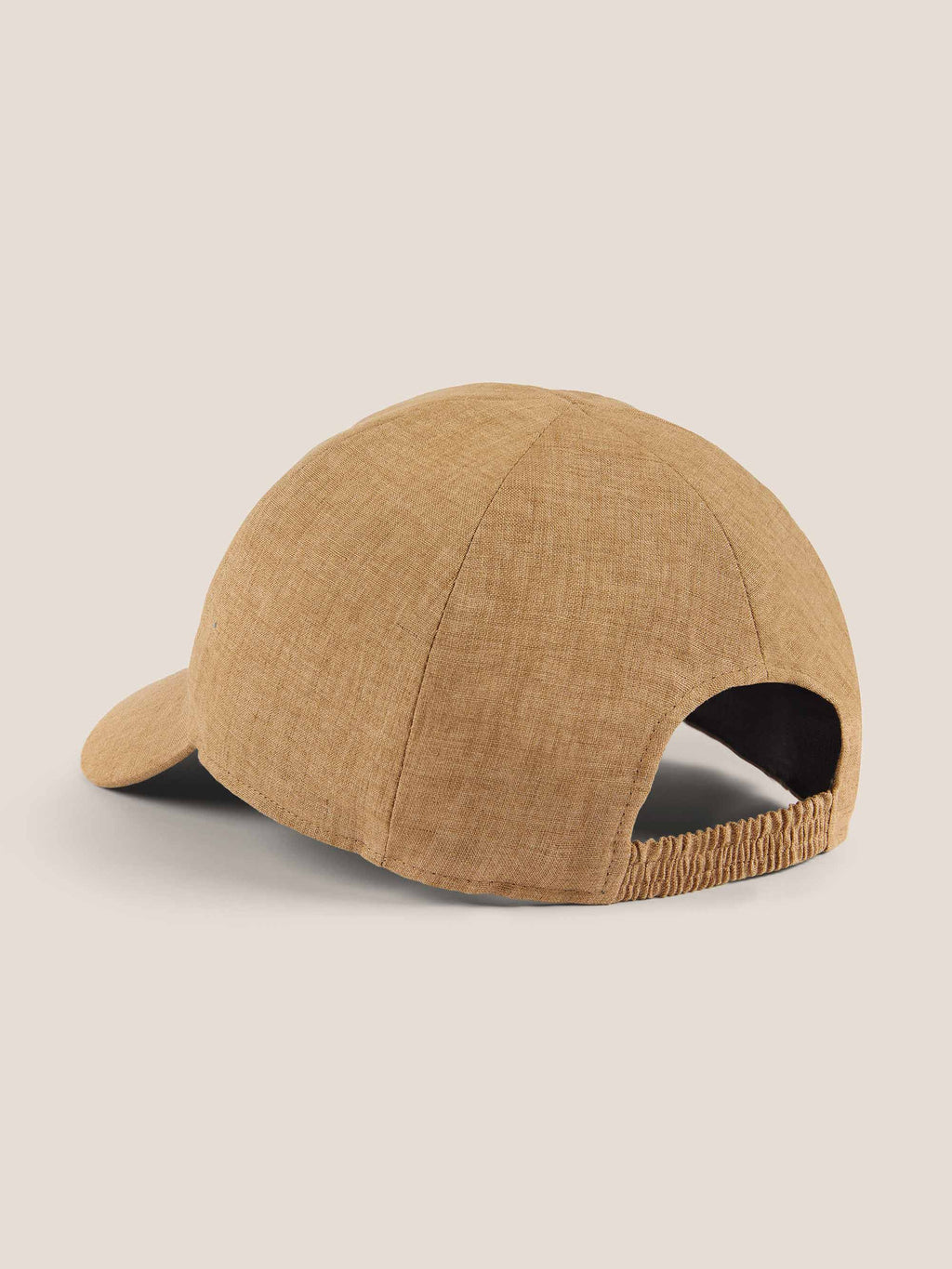 Rear view of the Caramel Brown Linen Baseball Cap, showing the elasticated back strap and fine linen texture.