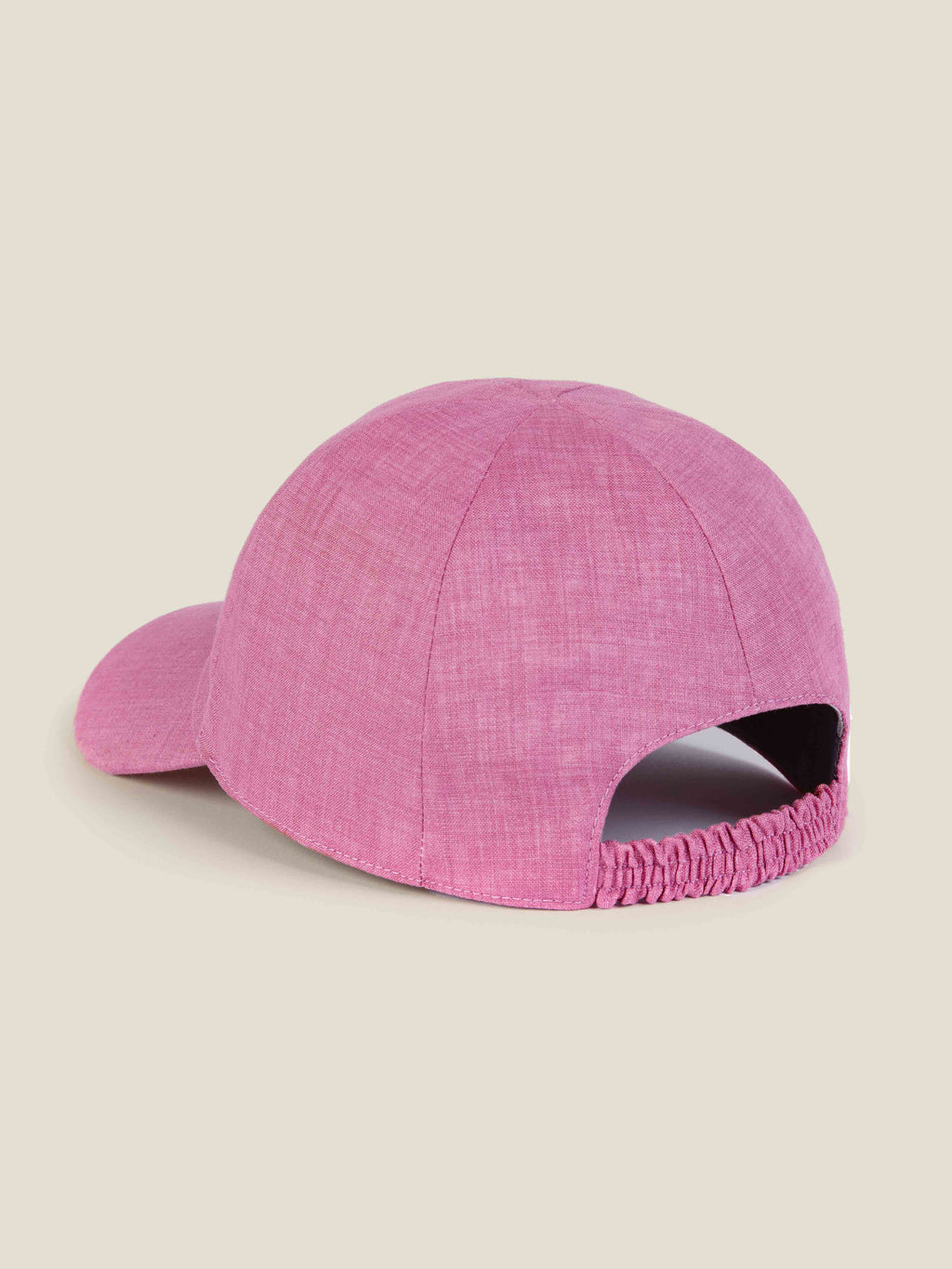 Back view of the Luca Faloni Linen Baseball Cap in dusty pink, highlighting the elasticated strap for a comfortable fit.
