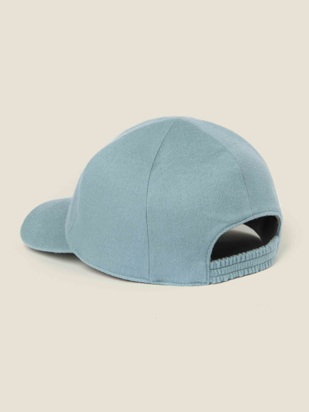 Back view of the Luca Faloni French Blue Cashmere Baseball Cap, highlighting the comfortable elasticated strap.