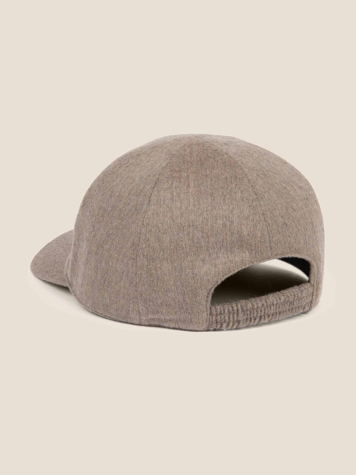Rear view of the Oatmeal Cashmere Baseball Cap, showing the detail of the elasticated back strap.