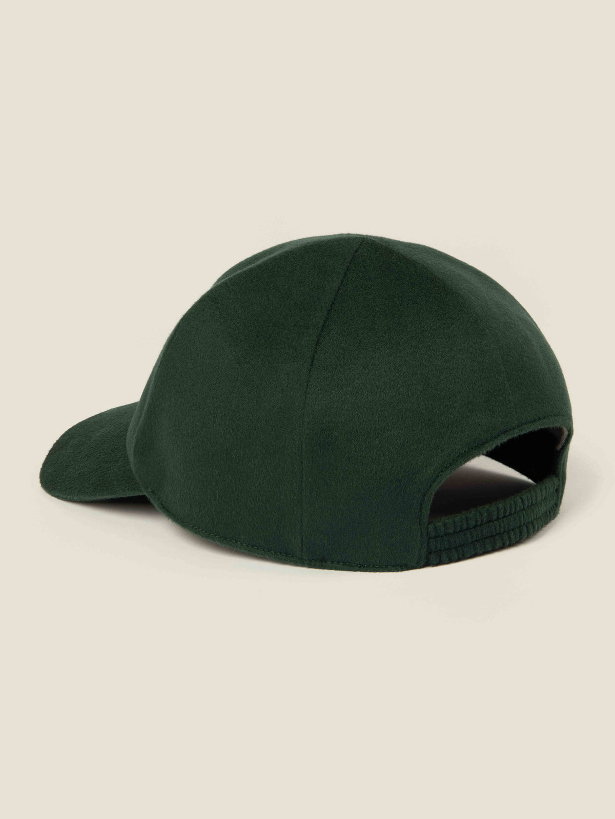 Rear three-quarter view of the Forest Green Cashmere Baseball Cap, showing the elasticated back strap.