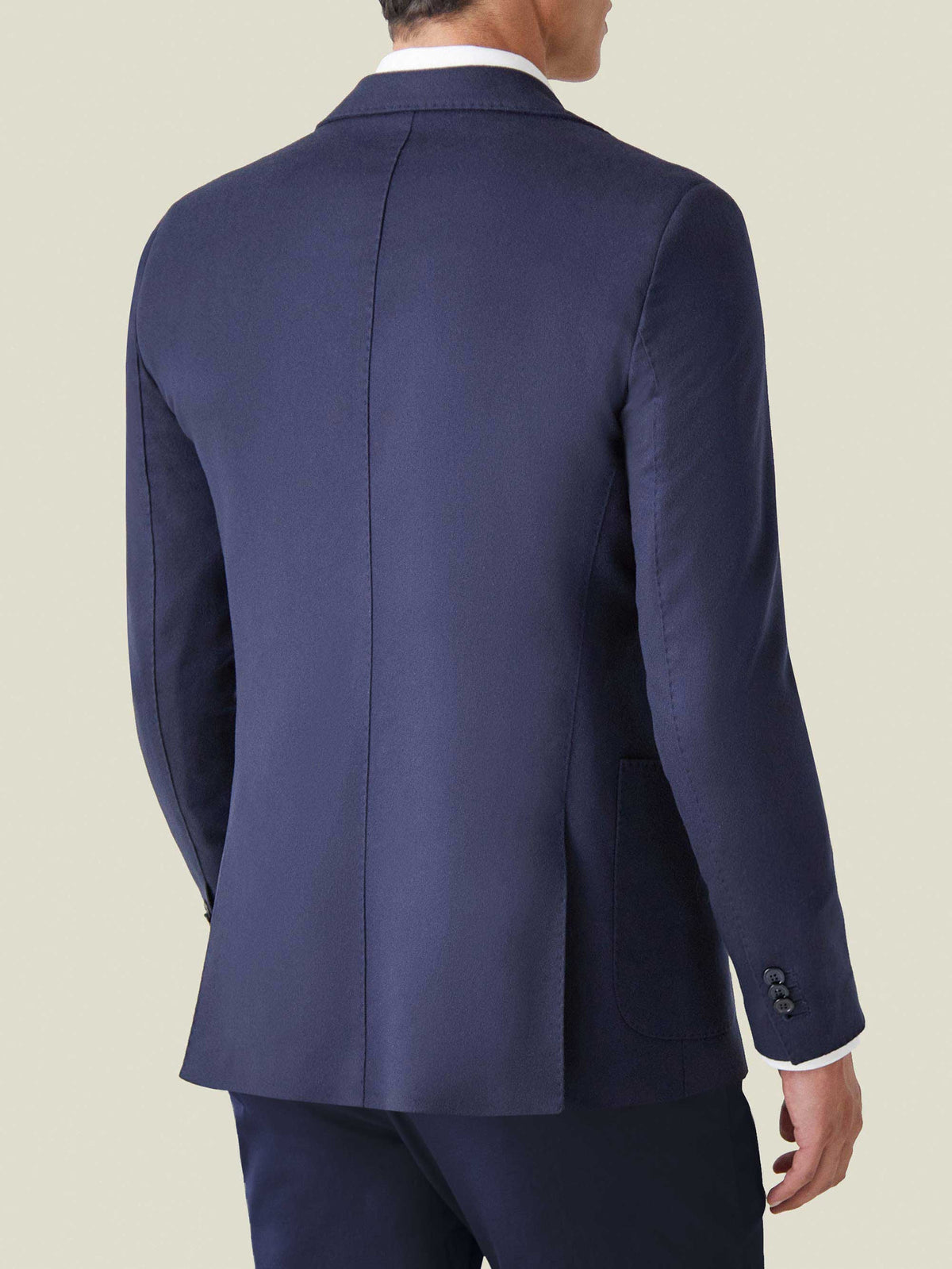 Back view of the Luca Faloni Navy Blue Cashmere Blazer, highlighting its tailored structure and slim fit.