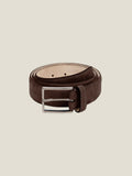 A coiled view of the Luca Faloni Classic Suede Belt in Dark Brown, showcasing its soft texture and silver buckle.