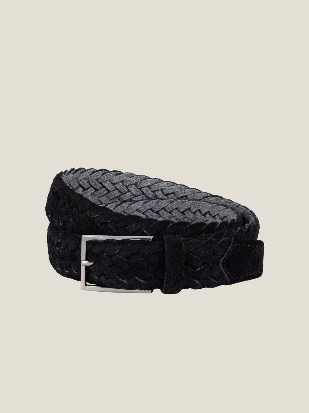 Front view of the Luca Faloni Woven Suede Belt in black, coiled and laid flat.