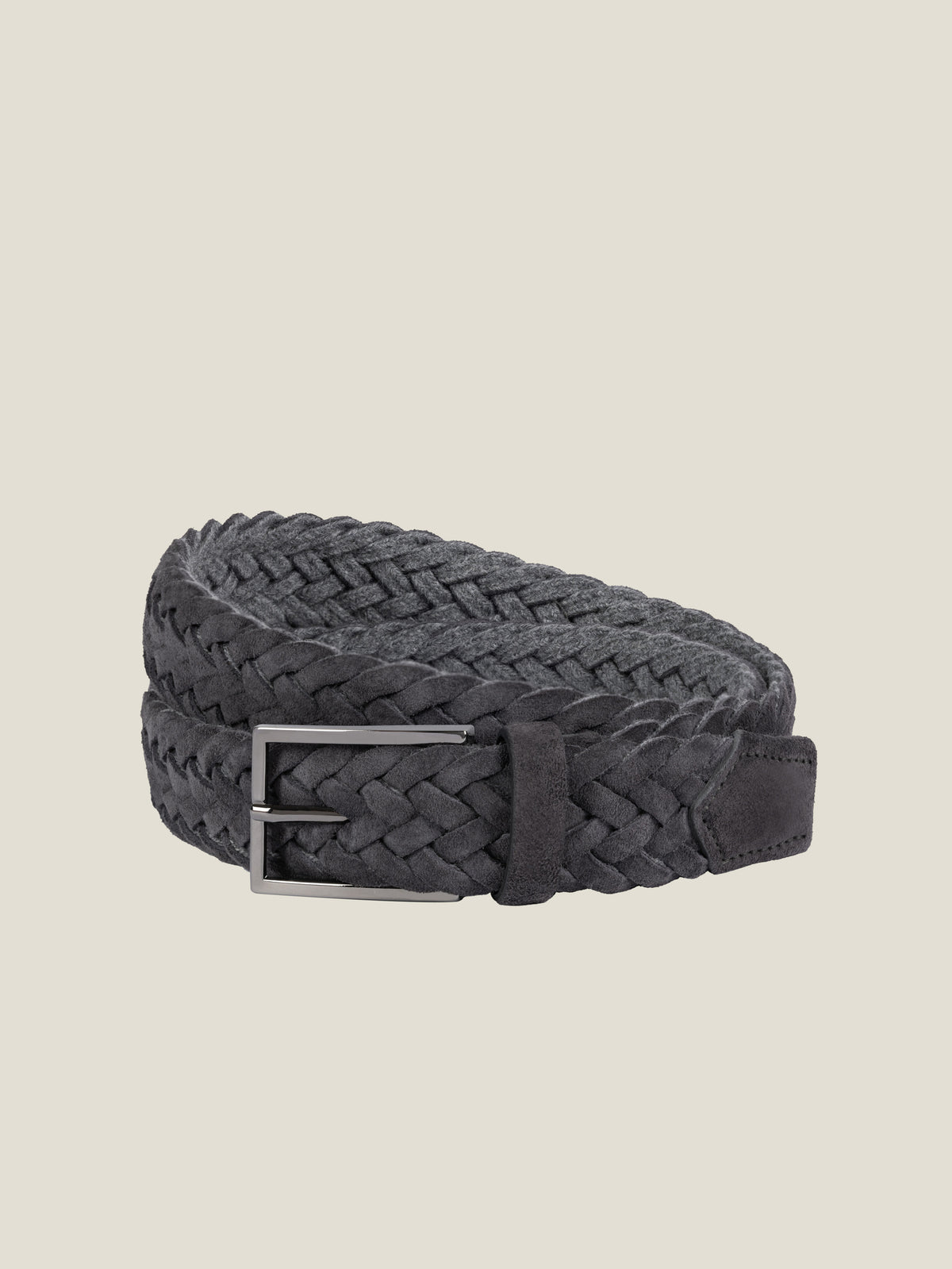 Front view of the Luca Faloni Woven Belt in charcoal grey, coiled against a plain background.