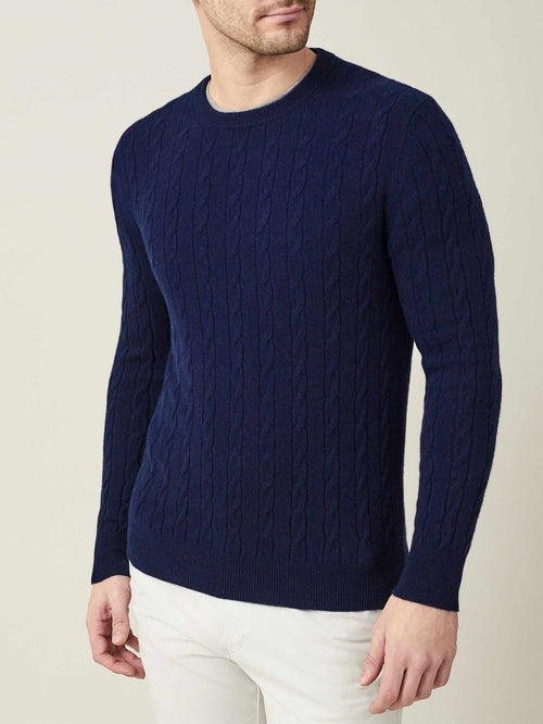 Man wearing the Midnight Blue Cable Knit crew neck jumper in pure cashmere from Luca Faloni.