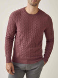 A model wears the Luca Faloni Cable Knit cashmere jumper in Desert Rose.