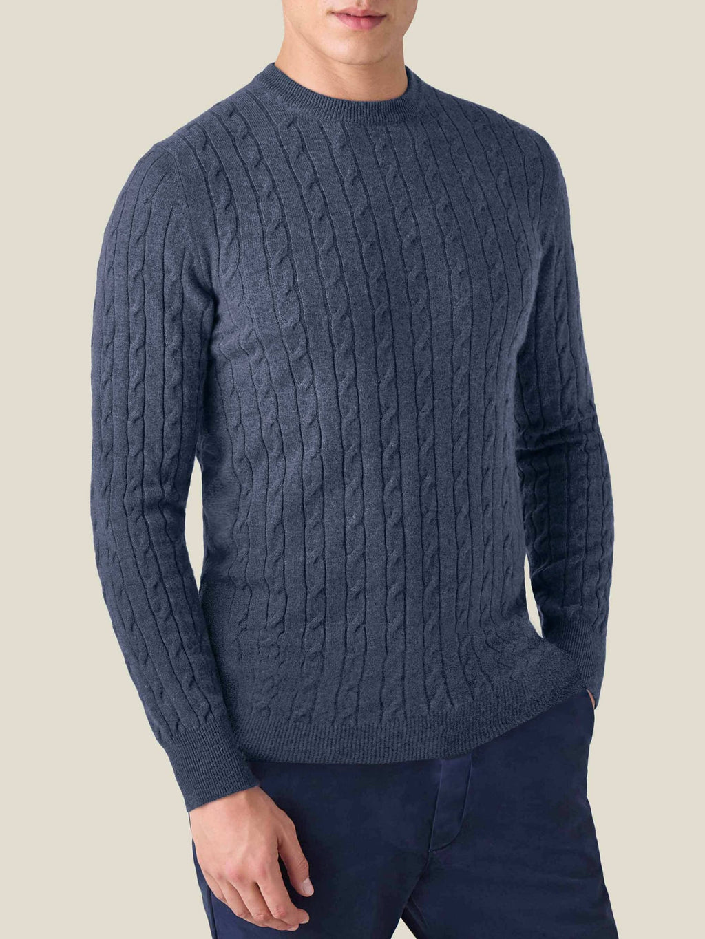 Front view of a man wearing the Luca Faloni Atlantic Blue cashmere cable knit crewneck.