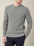 Front view of a model wearing the Luca Faloni Chunky Knit Crew Neck in Dolomiti Grey cashmere with a ribbed finish.