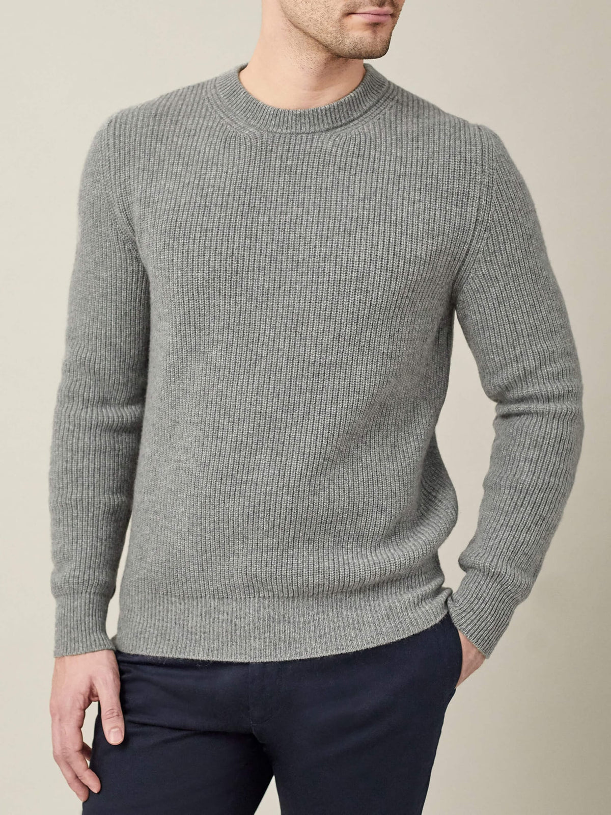 Front view of a model wearing the Luca Faloni Chunky Knit Crew Neck in Dolomiti Grey cashmere with a ribbed finish.