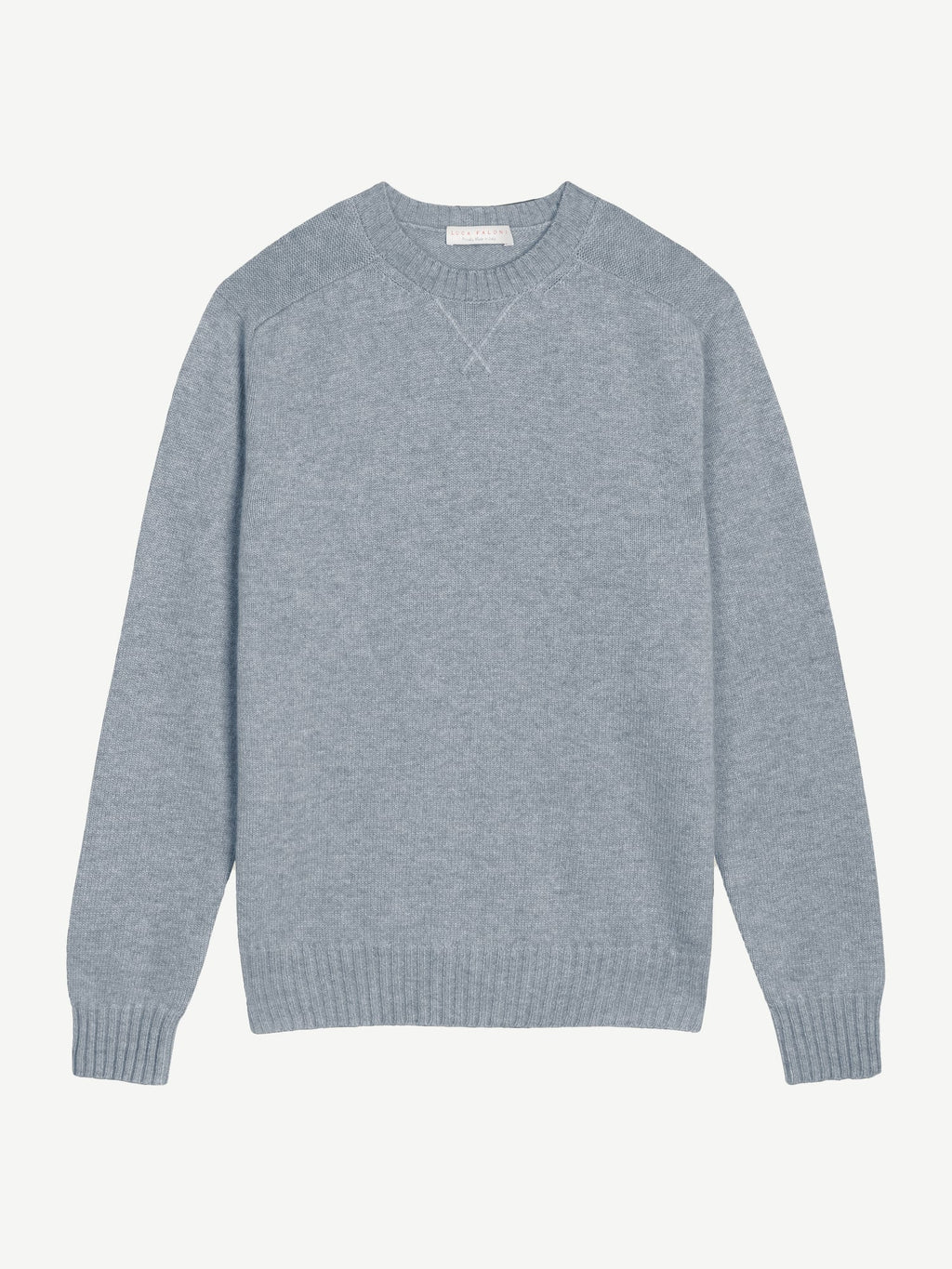 Light blue cashmere Country Crew Neck sweater laid flat, highlighting the heritage cross-stitch collar and ribbed trims.