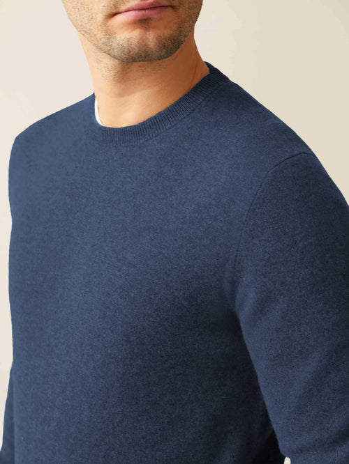 Close-up of a model wearing the Atlantic Blue Cashmere Crew Neck, highlighting the ribbed collar and soft fabric texture.
