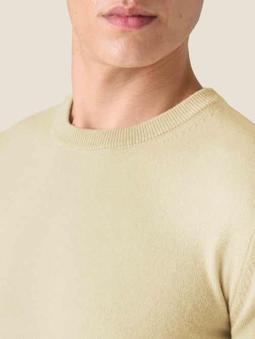 Close-up detail of the ribbed neckline on Luca Faloni's Yellow Cashmere Crew Neck sweater.
