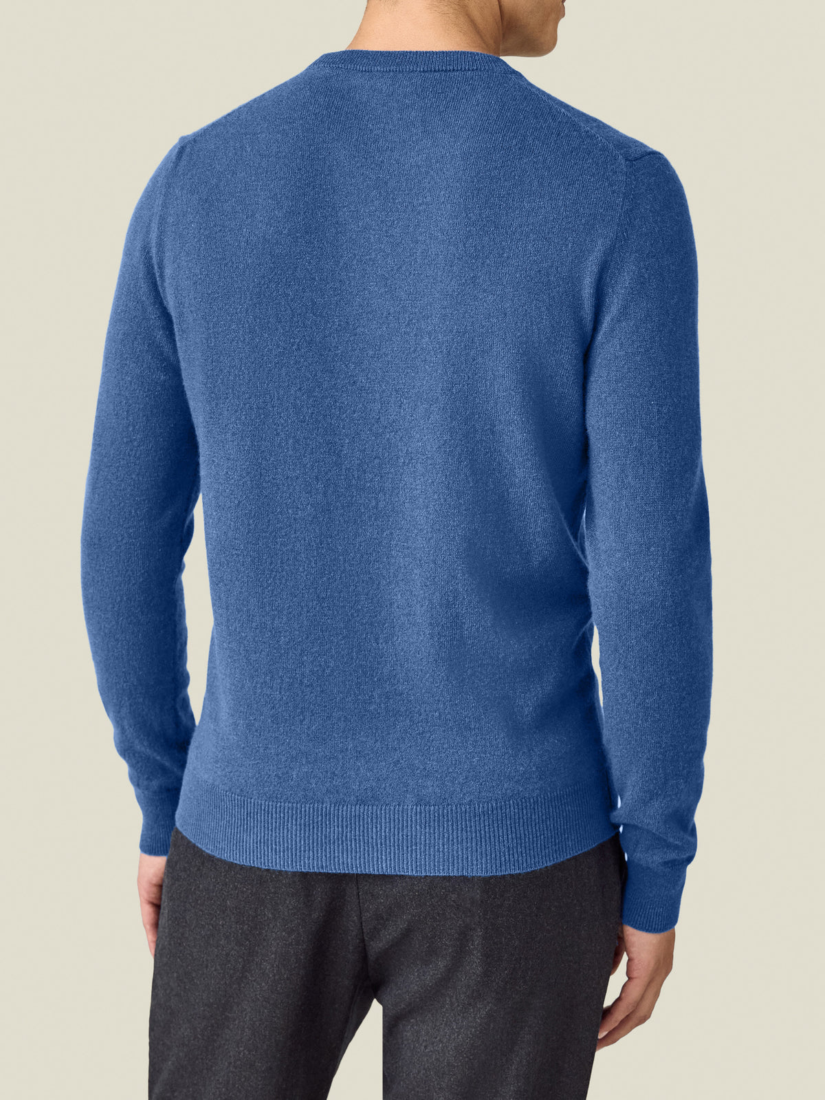 Back view of a model wearing the Luca Faloni Cashmere Crew Neck in cobalt blue.