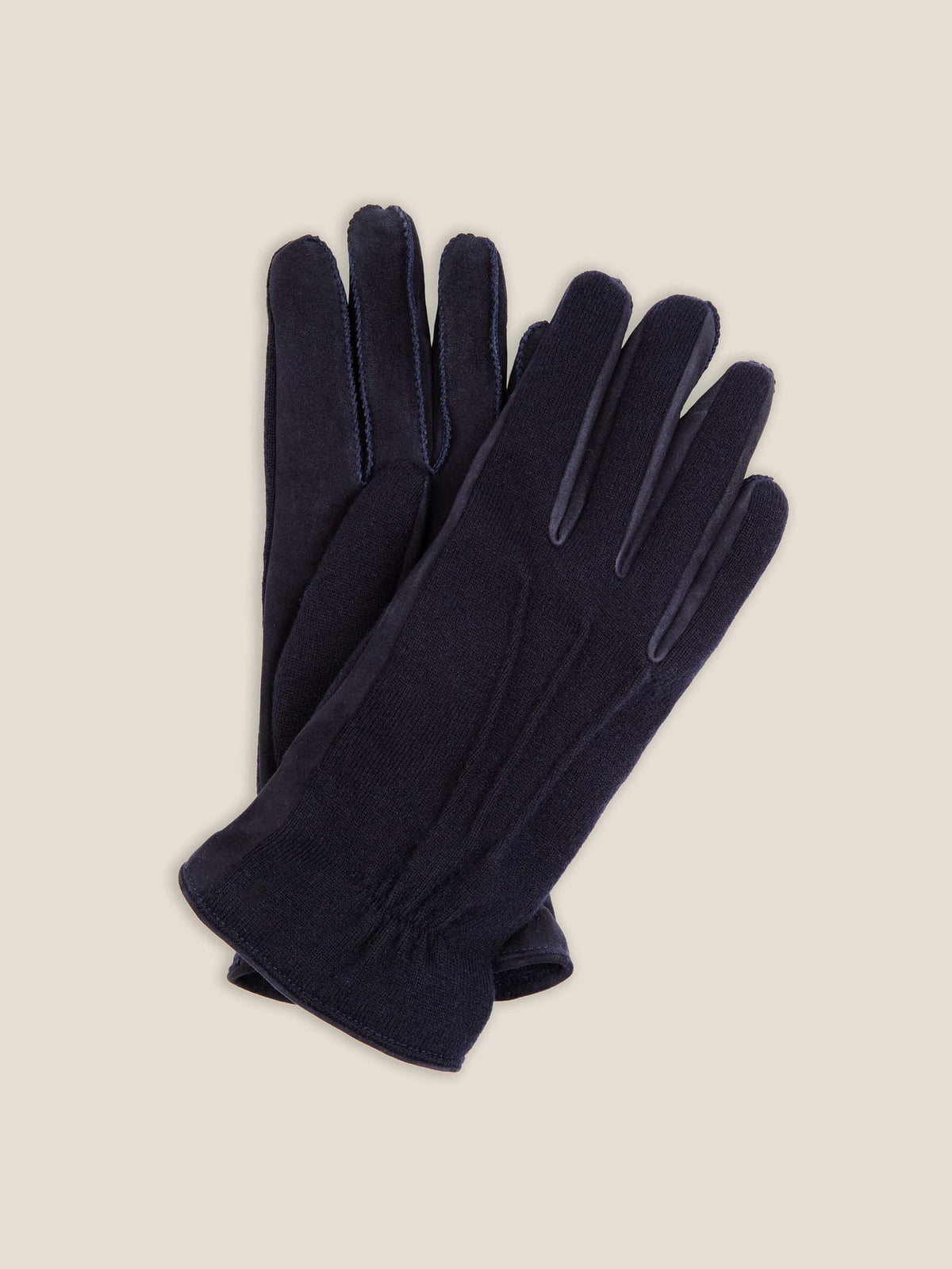 A flat lay of the Luca Faloni Cashmere and Suede Gloves in Midnight Blue.