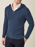 Front view of a model wearing the Atlantic Blue Cashmere Hoodie over a white collared shirt and dark trousers.