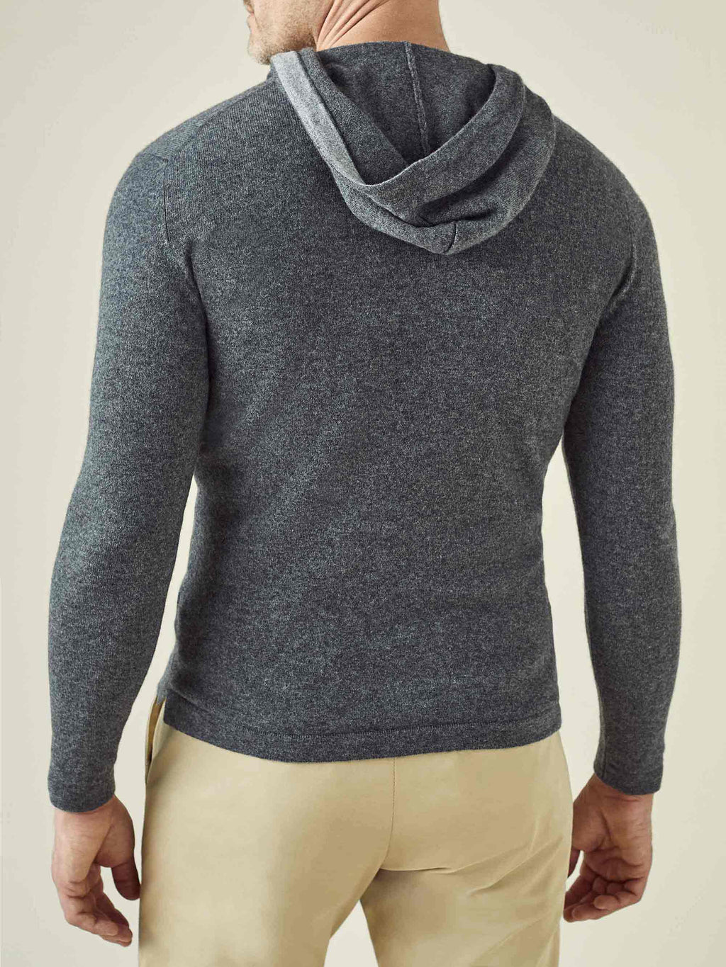 Back view of the Luca Faloni stone grey cashmere hoodie showing the relaxed fit and hood.