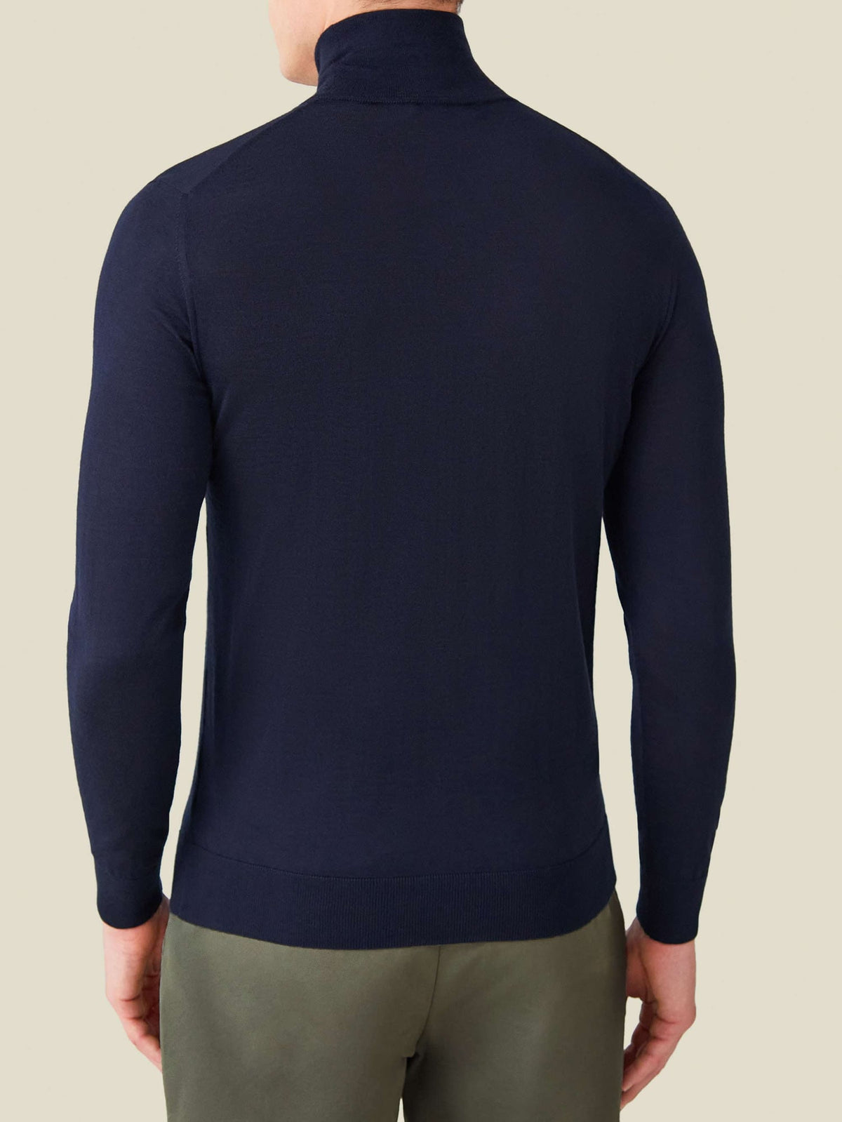 Back view of a man wearing the Navy Blue Silk-Cashmere Mock Neck.