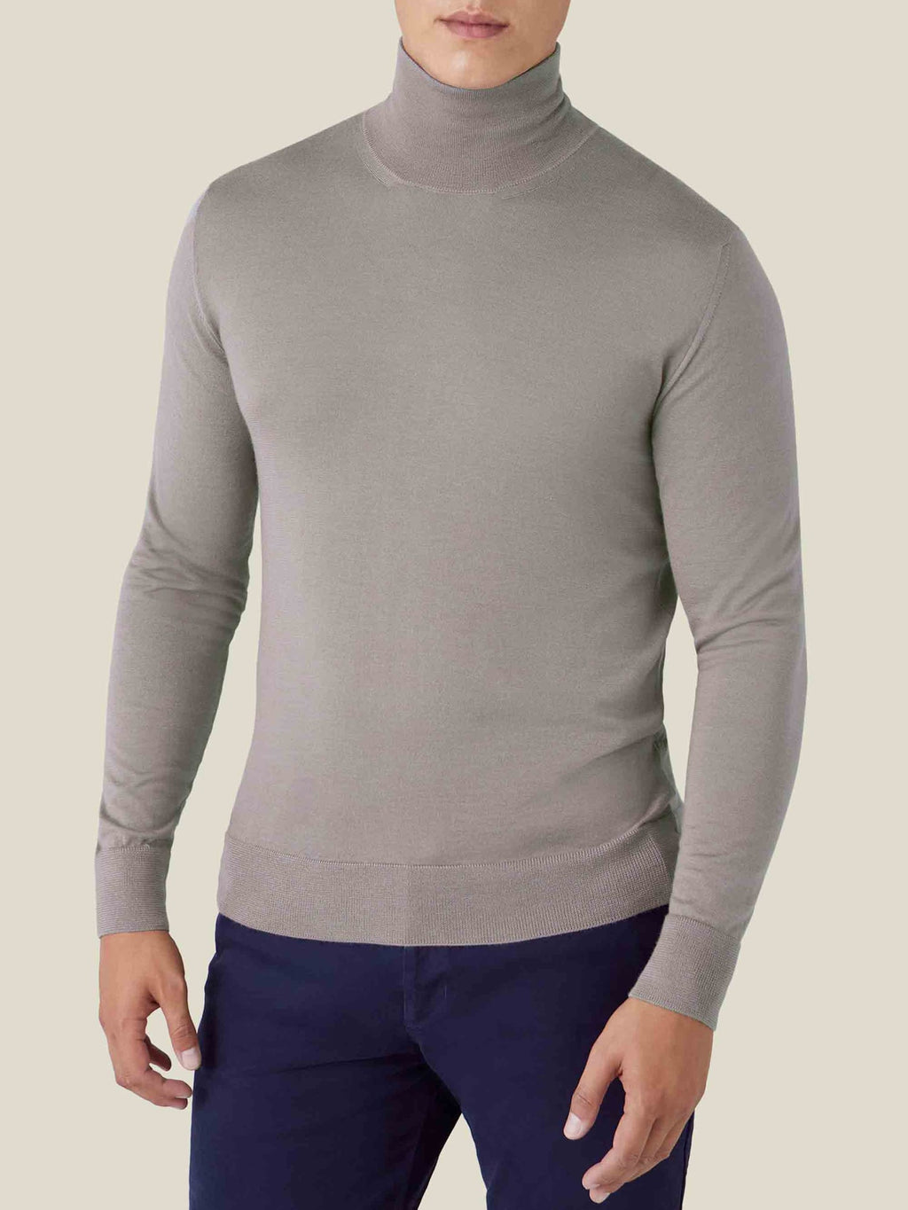Front view of a model wearing the Luca Faloni Silk-Cashmere Mock Neck in Nocciola Brown against a plain background.