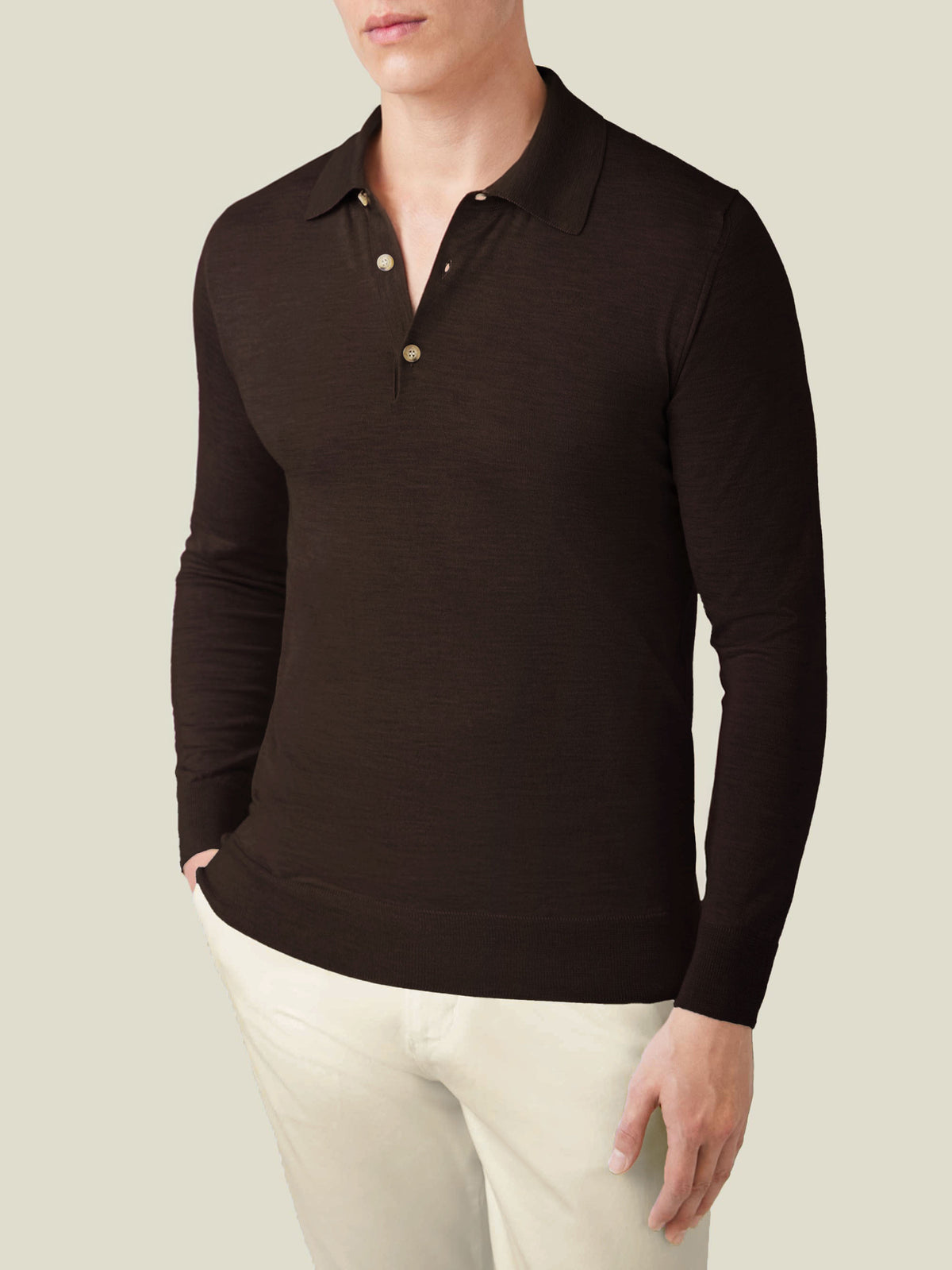 A front view of a model wearing the Fine Silk Cashmere Polo in Chocolate Brown, showcasing its refined fit and classic style.