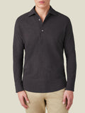 Front view of a model wearing the long-sleeved Brera Piqué Polo Shirt in Charcoal Grey.