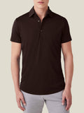 Front view of a model wearing the Luca Faloni Short-sleeved Silk Cotton Polo in chocolate brown against a plain background.