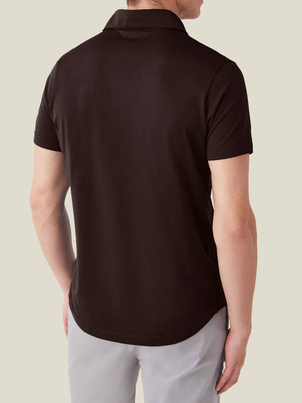 Back view of a model wearing the Luca Faloni Short-sleeved Silk Cotton Polo in chocolate brown.