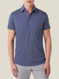 Front view of a man wearing the Ocean Blue Short-Sleeved Silk-Cotton Polo.