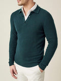 Front-side view of a man wearing the Luca Faloni forest green cashmere polo sweater layered over a white collared shirt.