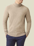 Front view of a man modelling the Luca Faloni Cashmere Roll Neck in Camel Beige.