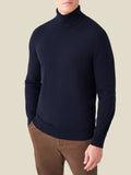 Front view of a model wearing the Luca Faloni Cashmere Roll Neck in midnight blue.