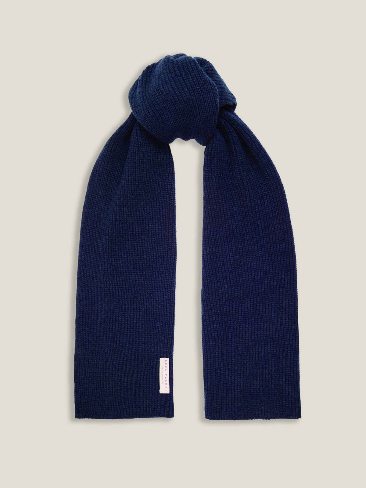Front view of the Luca Faloni Chunky Knit Scarf in Midnight Blue, tied in a simple knot against a studio background.