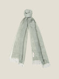 A studio shot of the Luca Faloni Linen Scarf in khaki, styled in a simple knot and showing the fringed edges.