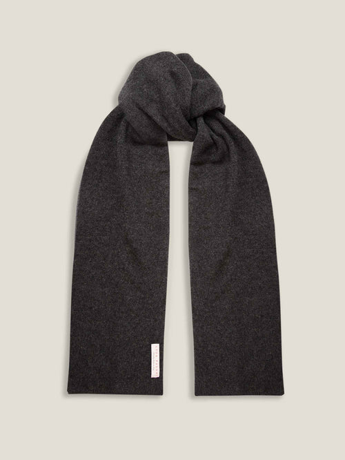 A Luca Faloni charcoal grey cashmere scarf tied in a knot and displayed on a plain background.