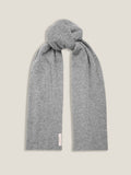 The Luca Faloni cashmere scarf in Dolomiti Grey, presented in a simple knot against a neutral background.
