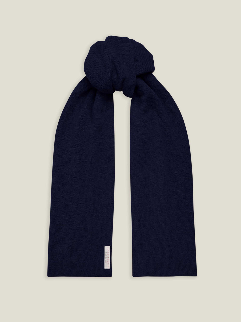 A front view of the Luca Faloni Pure Cashmere Scarf in midnight blue, knotted and laid flat against a plain background.