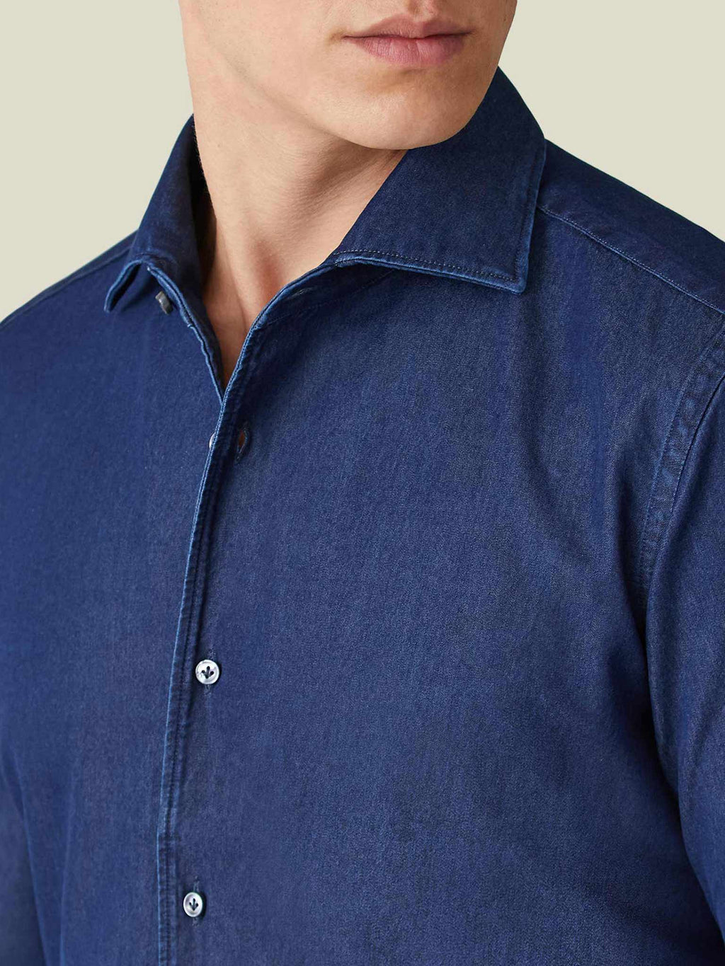 Detailed shot of the Luca Faloni Denim Shirt in Midnight Blue, showcasing the fine fabric and signature one-piece collar.