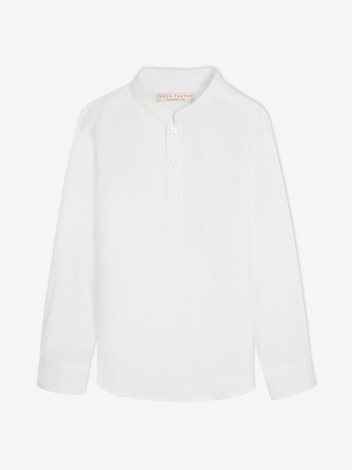 Studio shot of the Forte Junior Linen Shirt in white, laid flat to display its band collar and long sleeves.