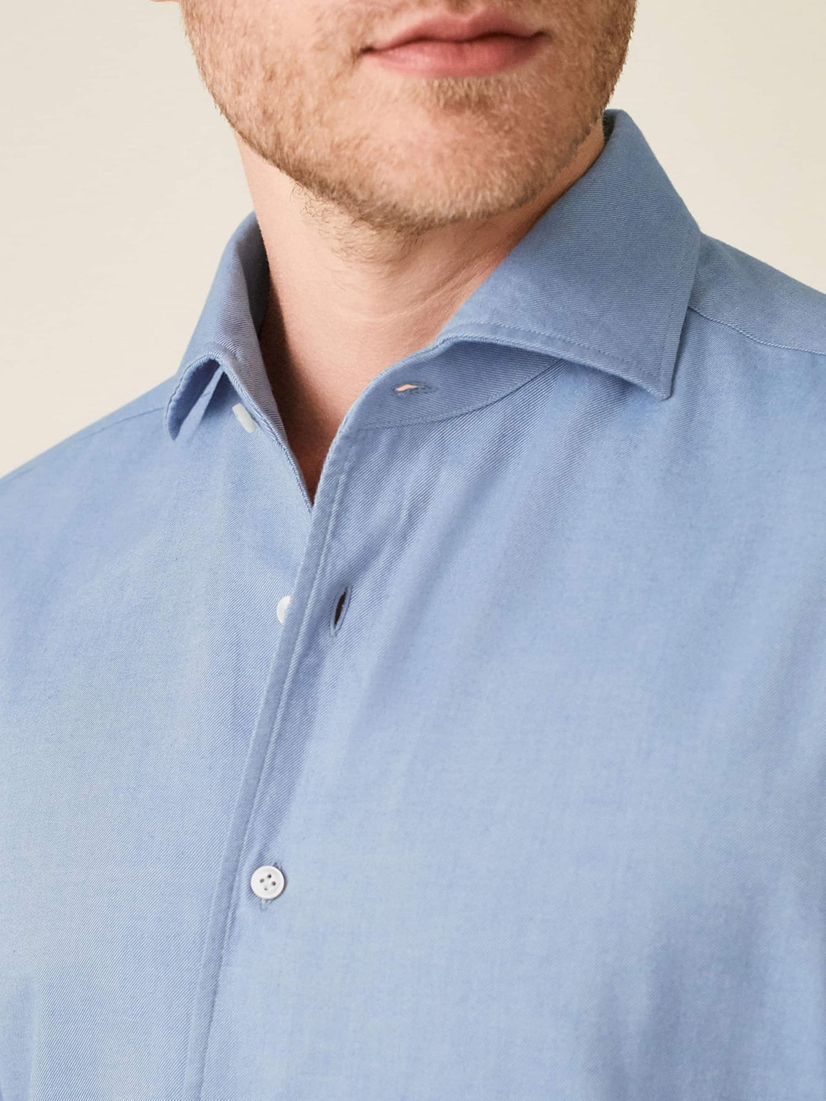 A close-up of the one-piece collar and soft fabric of the Light Blue Brushed Cotton Shirt by Luca Faloni.
