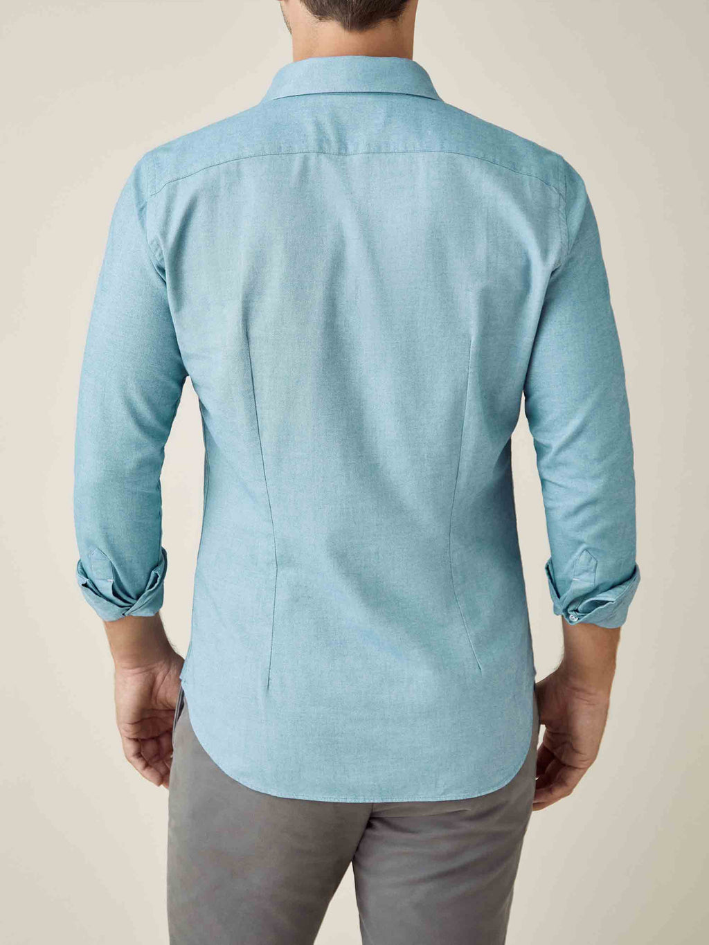 Back view of a model wearing the Luca Faloni Brushed Cotton Shirt in Topaz, showing the slim fit silhouette.