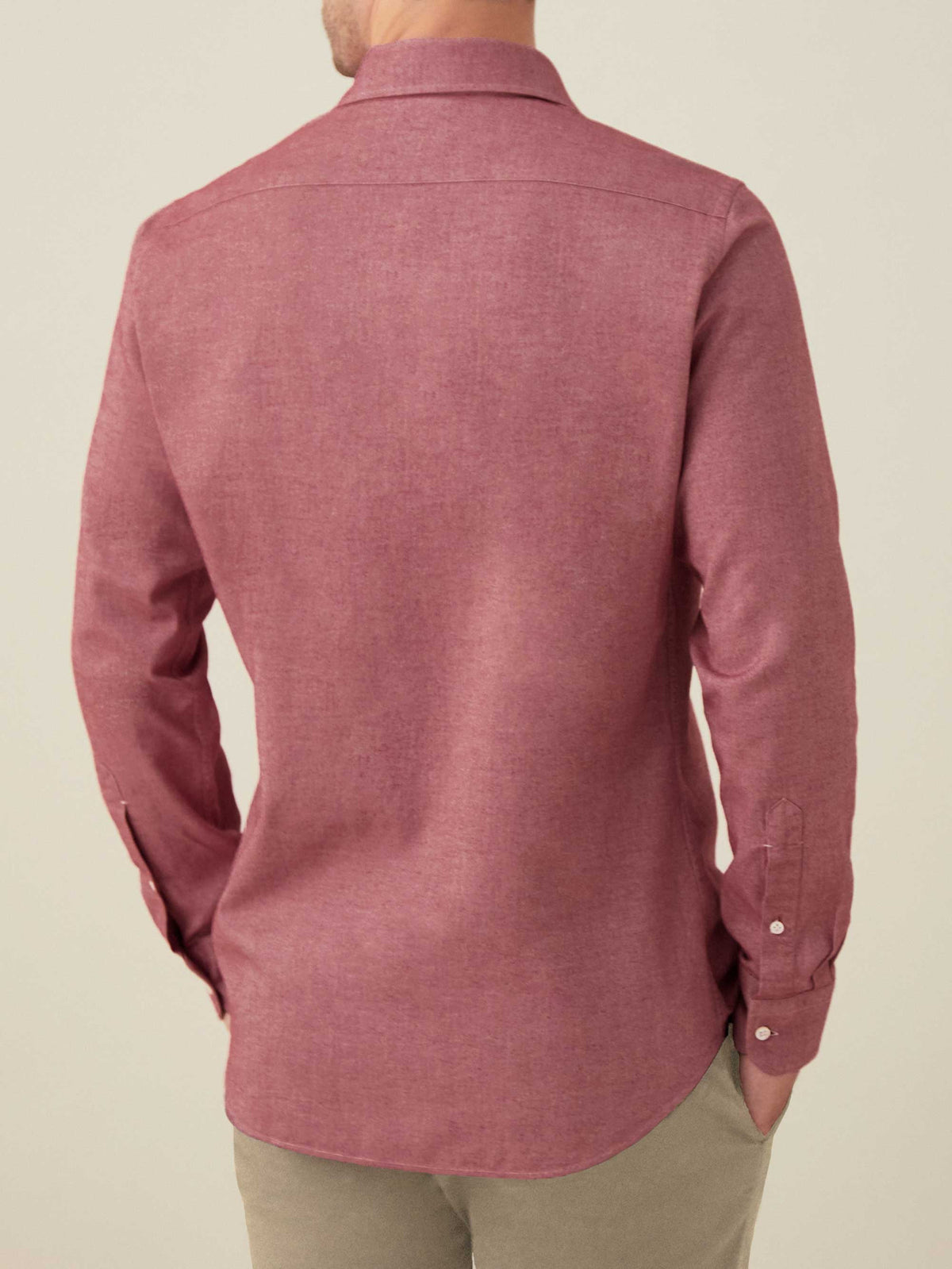 Back of a model wearing the Red Brushed Cotton Shirt by Luca Faloni, showcasing the tailored fit and rounded hem.