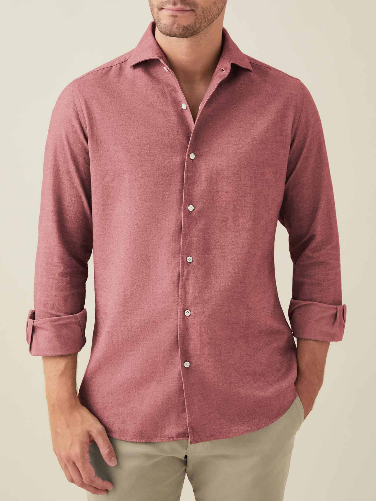 Front view of a model wearing the Luca Faloni Red Brushed Cotton Shirt, styled with rolled-up sleeves and light chinos.